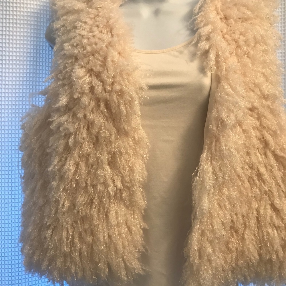 Chelsea and Violet faux sheep fur vest.